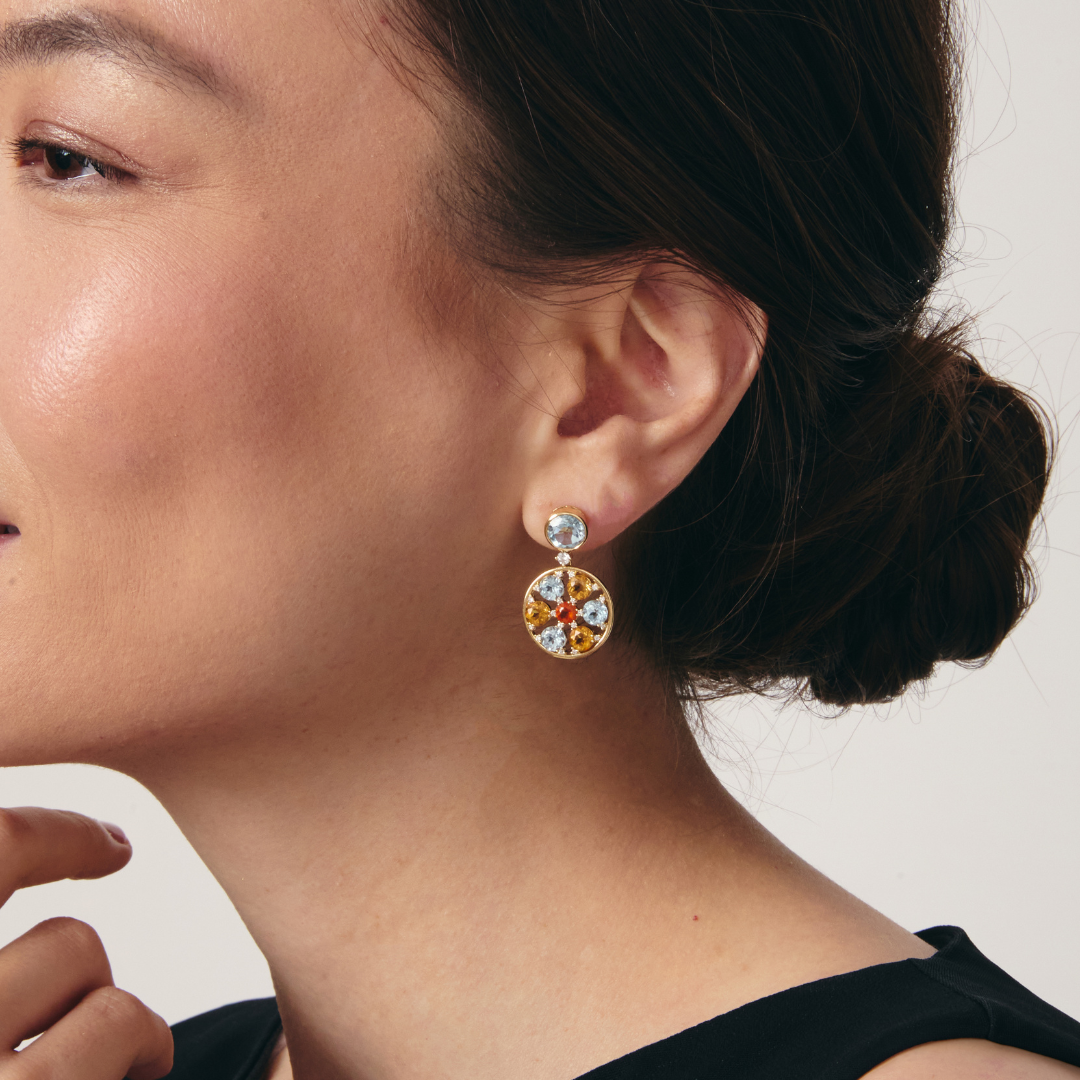 Fireworks Blue Topaz Spinner Earrings