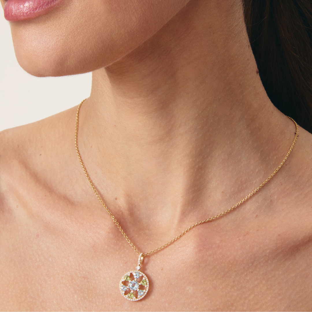 Fireworks Blue Topaz and Peridot Spinner Pendant