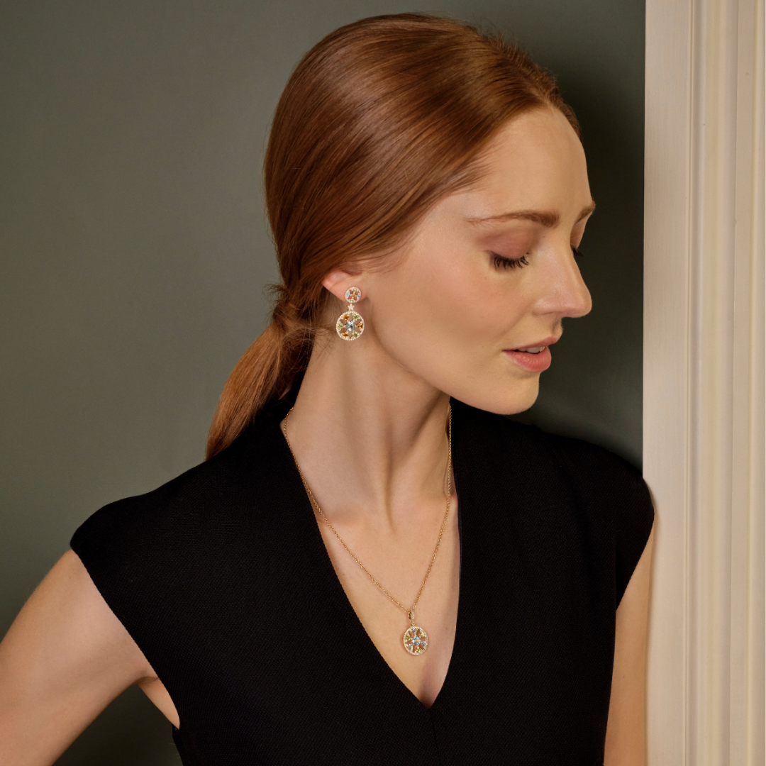 Fireworks Blue Topaz and Peridot Spinner Pendant