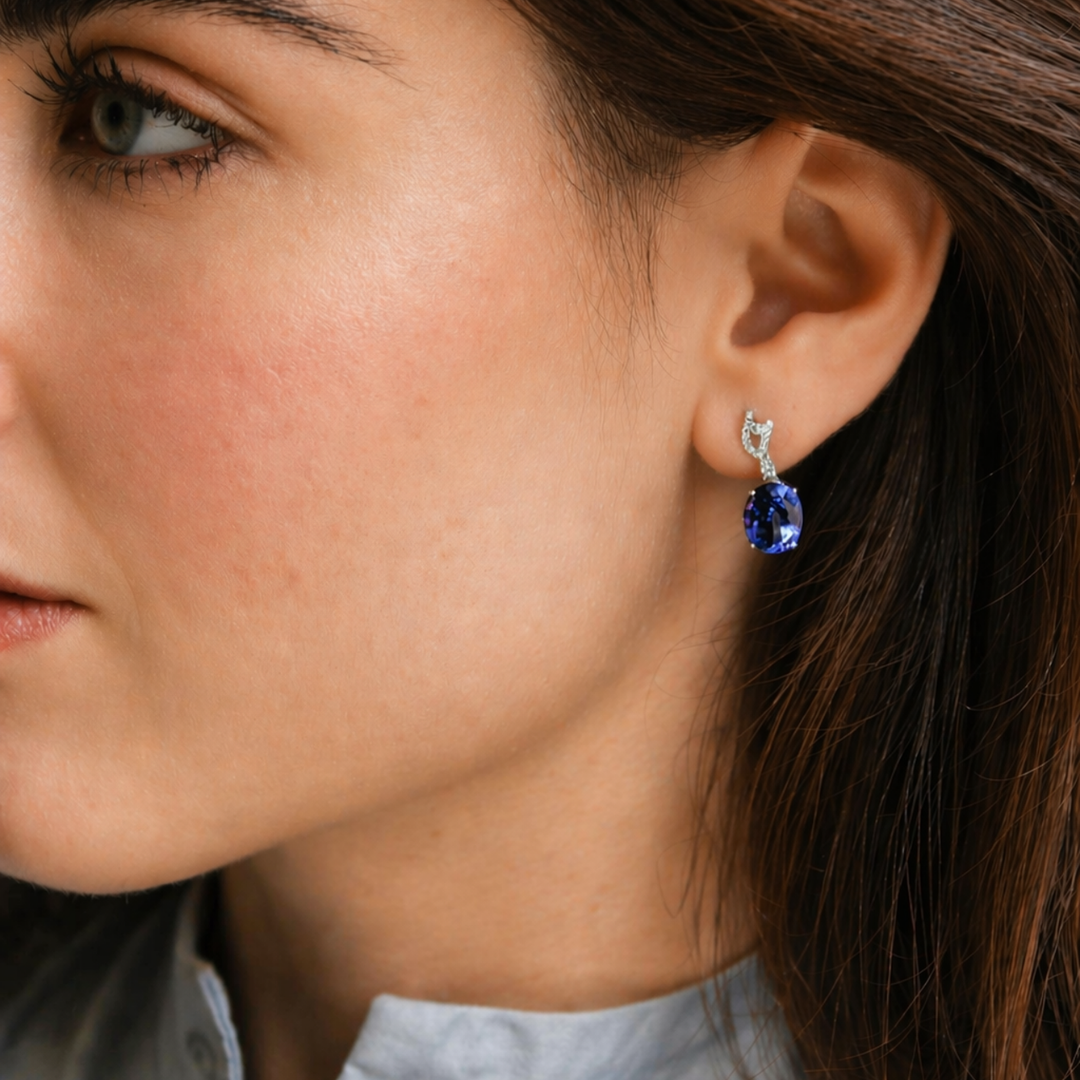 Wings Over Water Oval Tanzanite and Diamond Wave Detail Earrings