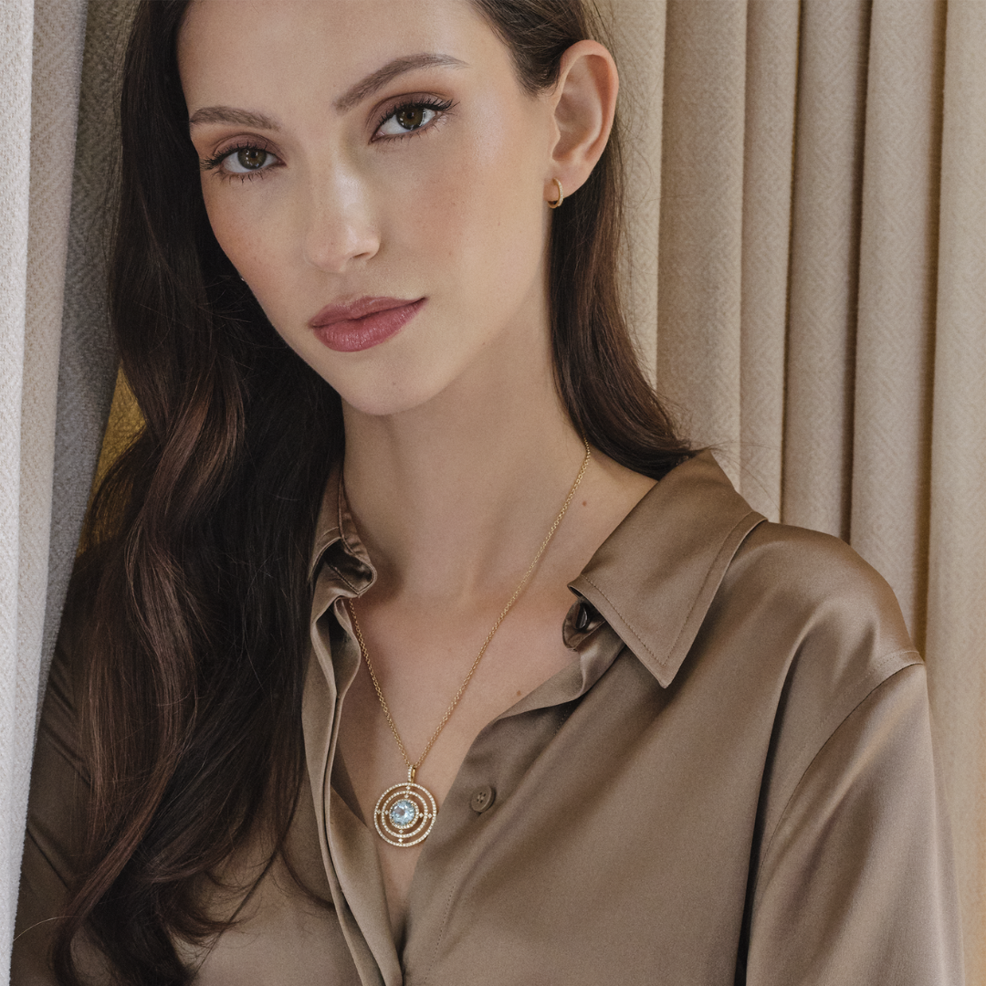 Apollo Sun Blue Topaz and Diamond Pendant