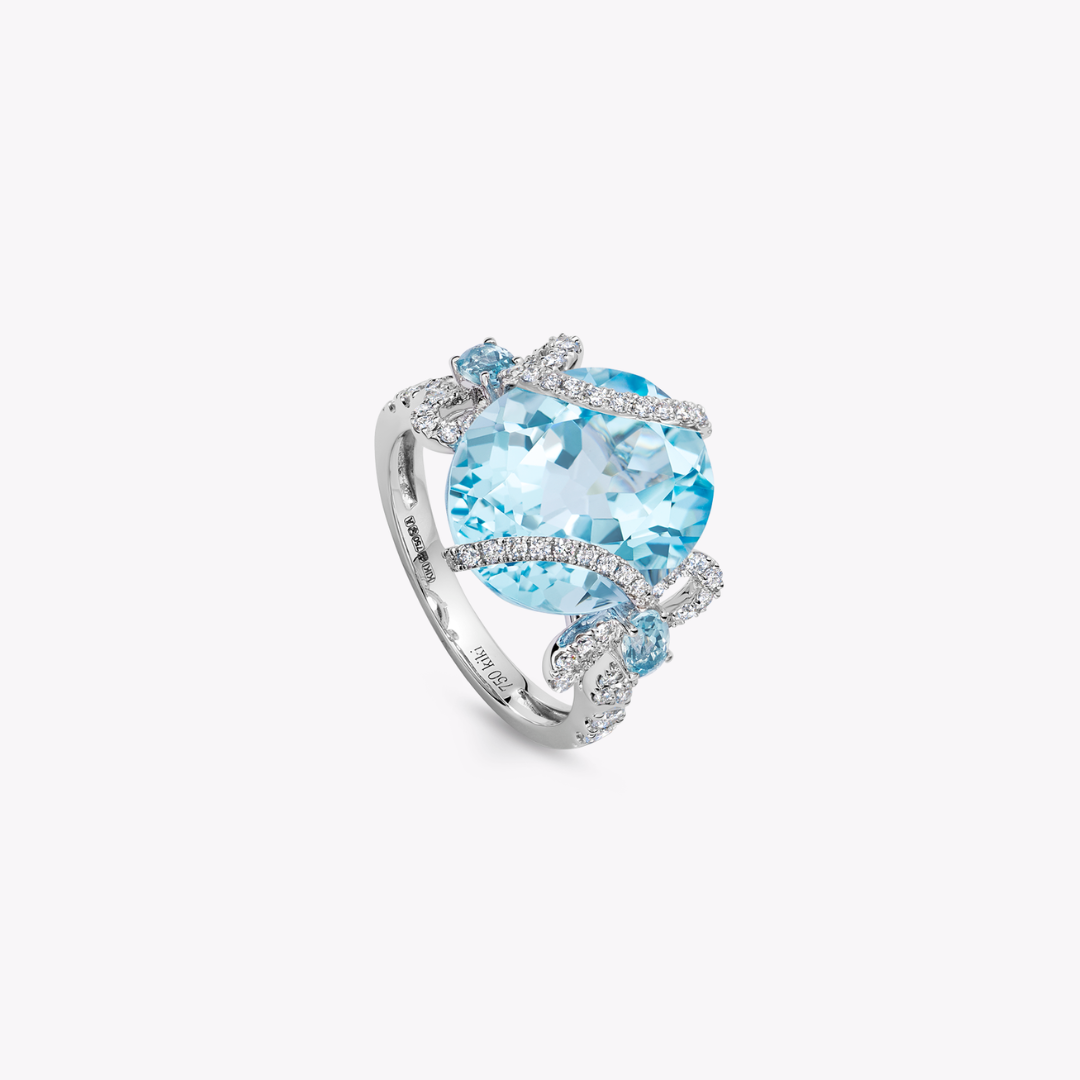 Special Editions Blue Topaz and Diamond Bow Ring