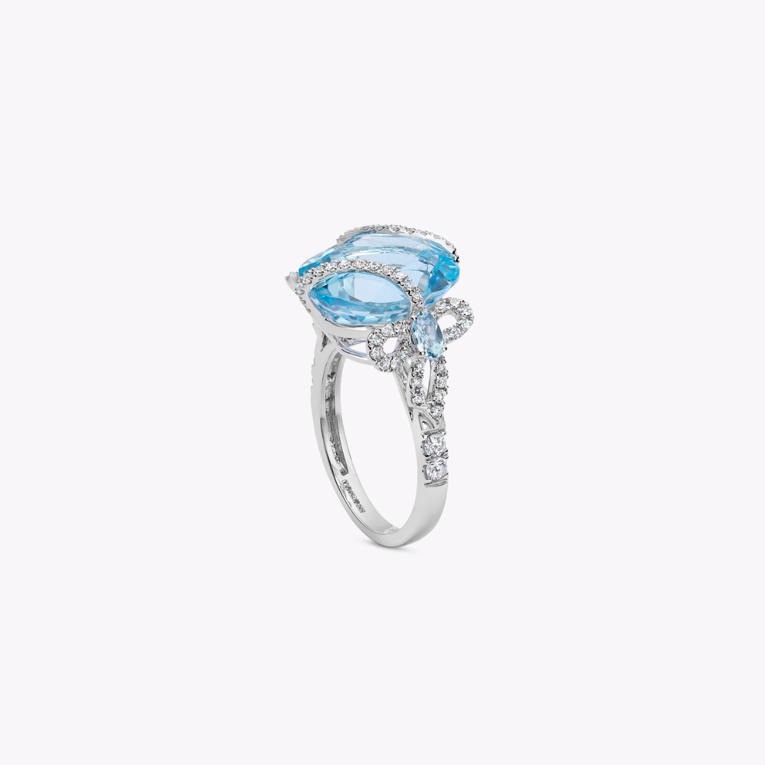 Special Editions Blue Topaz and Diamond Bow Ring